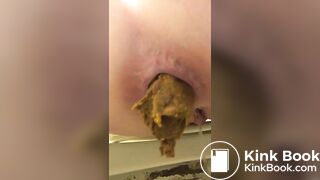 Girl shit and piss in a dirty toilet closeup