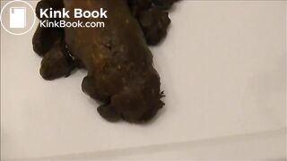 Shaved milf shitting closeup