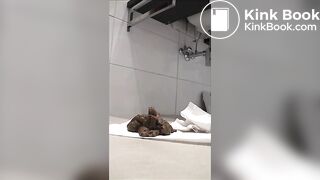 Hot babe in high heels shitting in the bathtub