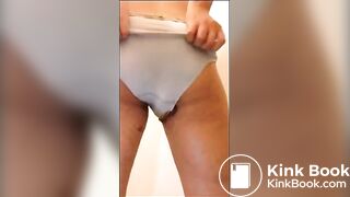 Hairy girl shitting on white panty