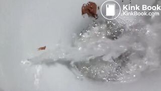 Pushing a big nasty turd