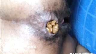 Hairy asshole latina shitting closeup