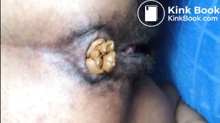 Hairy asshole latina shitting closeup