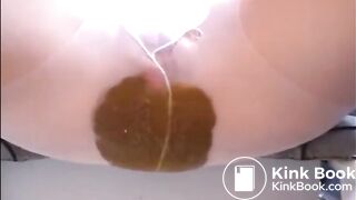 Girl shitting big diarrhea on white pantyhose