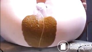 Girl shitting big diarrhea on white pantyhose