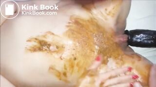 Woman masturbating with dildo and smearing shit
