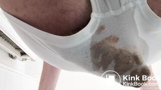 Guy with a nice ass, squeezes out a huge solid log