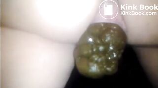 Woman suffer to shit a large turd closeup
