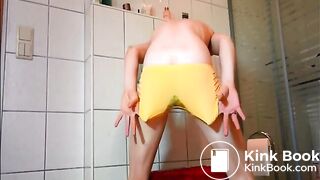 Blonde babe pooping on her yellow panty