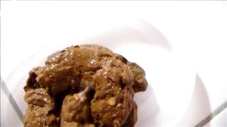 Sexy girl shitting in a plastic bowl