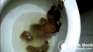 Round butt girl shitting standup in the toilet