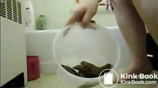 Dirty feet woman shitting in a plastic bowl