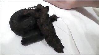 Sexy milf in lingerie and high heels shitting on the bathroom floor