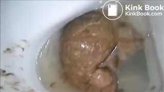 Babe open wide buttoks and shitting on the toilet