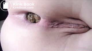 Shaved girl shitting closeup