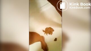 Blonde milf shitting a big quantity of diarrhea on white panty