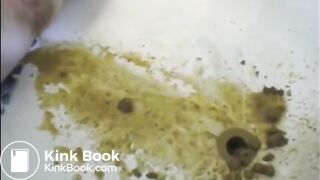 Woman shitting liquid after enema