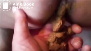 Big butt mature shitting on a man hand