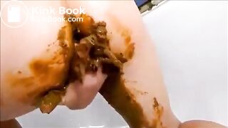 Girl smear shit on butt and cunt masturbating with dildo and fisting