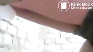 Women shitting in an abandoned building