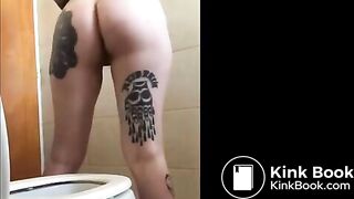 Tattooed girl shitting in the bathroom