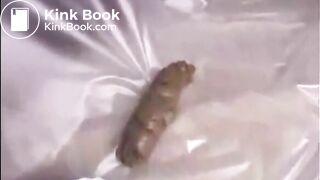 This woman is shitting a huge turd closeup