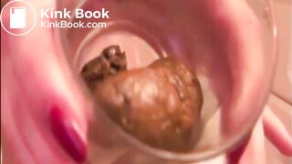 Skinny blonde girl shitting in a glass