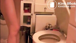 Skinny blonde girl shitting in a glass