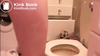 Skinny blonde girl shitting in a glass
