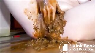 Woman masturbating with shit and dildo