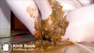 Woman masturbating with shit and dildo