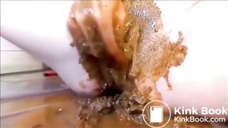 Woman masturbating with shit and dildo