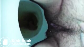 Hairy woman shit and piss in the toilet closeup