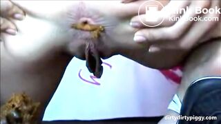 Big pussy lips woman shitting a very big turd