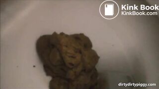 Girl shitting a lot close up in the toilet