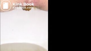 Girl shitting long turd closeup