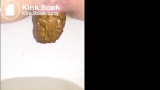 Girl shitting long turd closeup