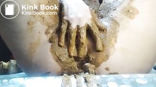 Ftm shits out a fat sloppy load then plays with it