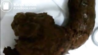 Hot brunette shitting and eating her own shit