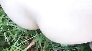 Blonde shitting outdoors