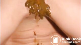 Perverted brunette shitting diarrhea on herself