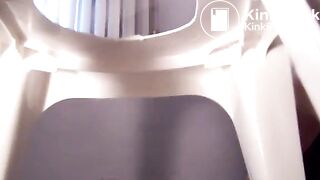 Shitting from a white chair