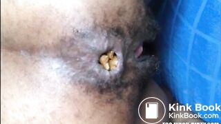 Hairy asshole ebony shitting closeup