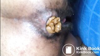 Hairy asshole ebony shitting closeup
