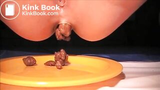 Woman shit and piss on a plate
