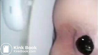 Girl shitting in the toilet closeup