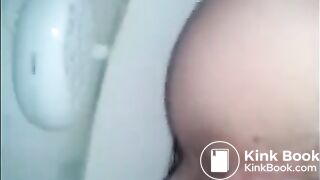 Girl shitting in the toilet closeup