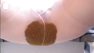 Woman shitting a lot of diarrhea on pantyhose