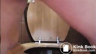 Hot butt babe shitting in the toilet