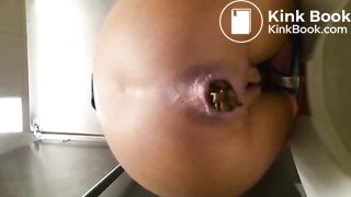 Young pretty girl's huge poop